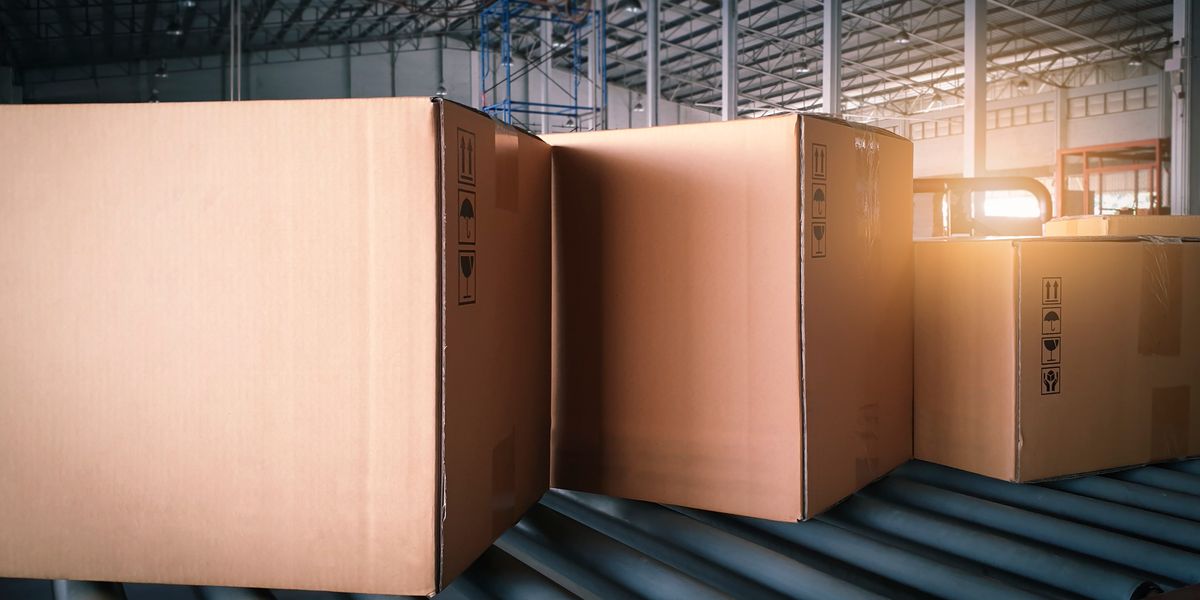 boxes on conveyor belt in warehouse