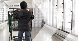 Boy in the frozen food isle