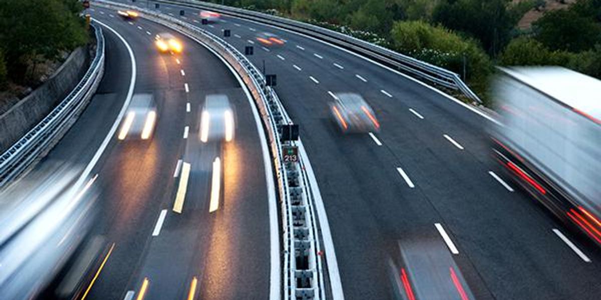 Busy highway with trucks and cars