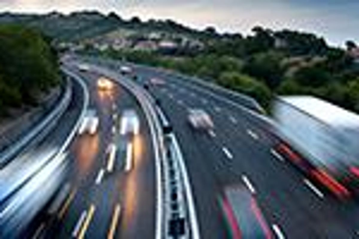 Busy highway with trucks and cars