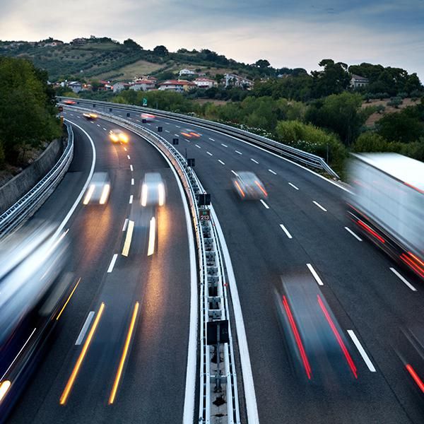 Busy highway with trucks and cars