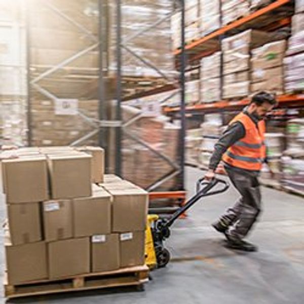 Man in warehouse with tablet