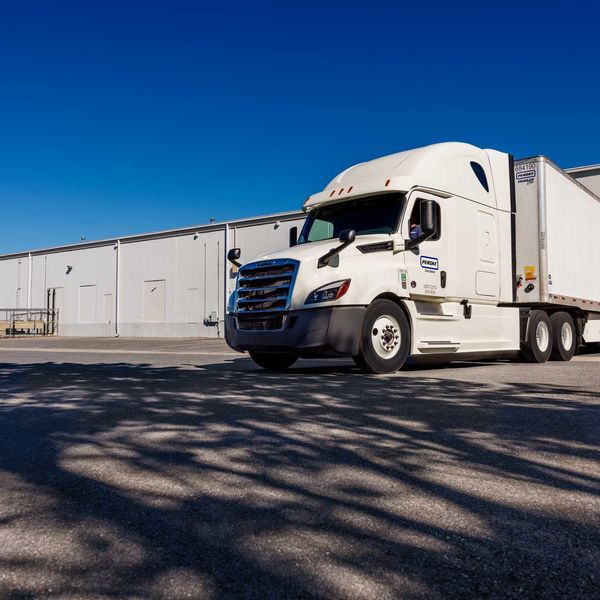 Penske tractor and trailer at warehouse