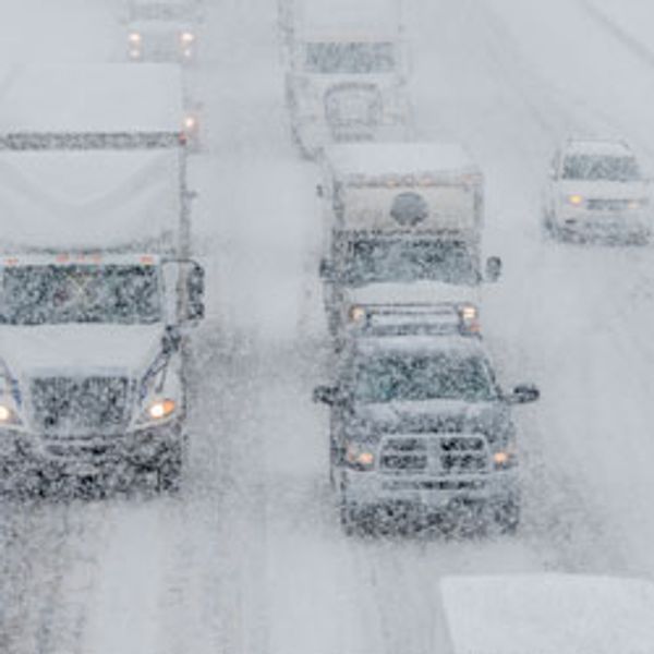 Snowy highway with traffic